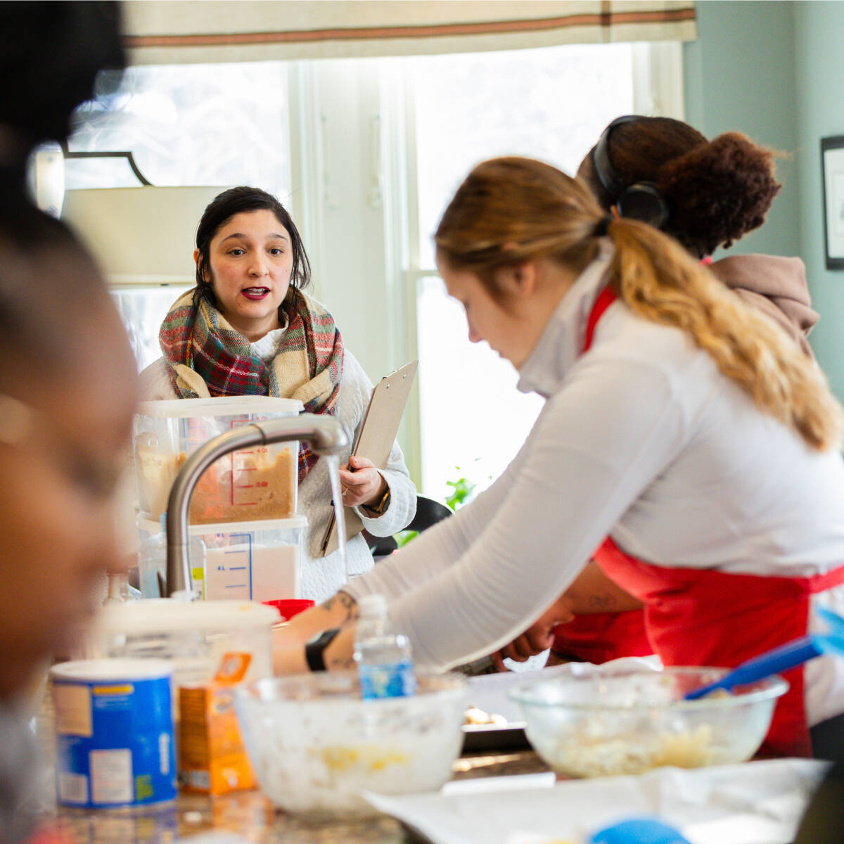 Students preparing food in a kitchen